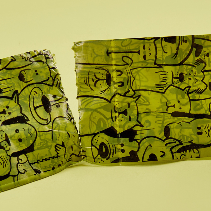 Emoji Dispensador Con 34 Bolsas para Perros